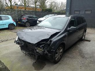 uszkodzony samochody osobowe Opel Astra 1.6 Cosmo 2010/9