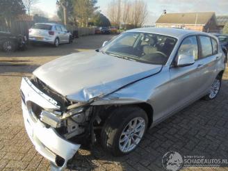 skadebil auto BMW 1-serie 116d 2014/9